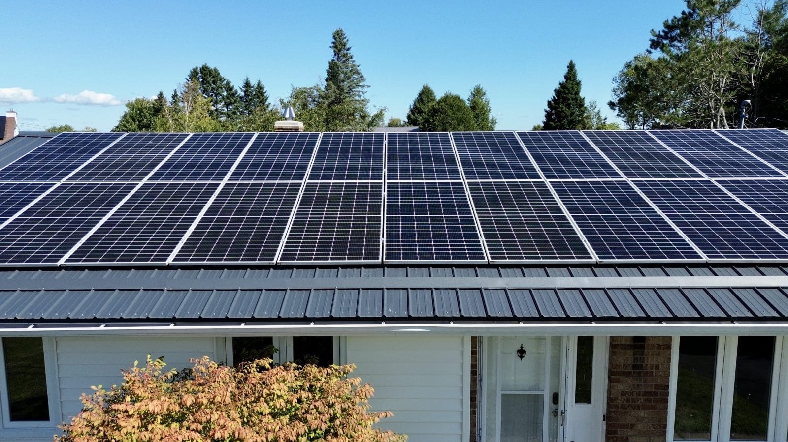 rooftop view of solar panels on the roof of a home.