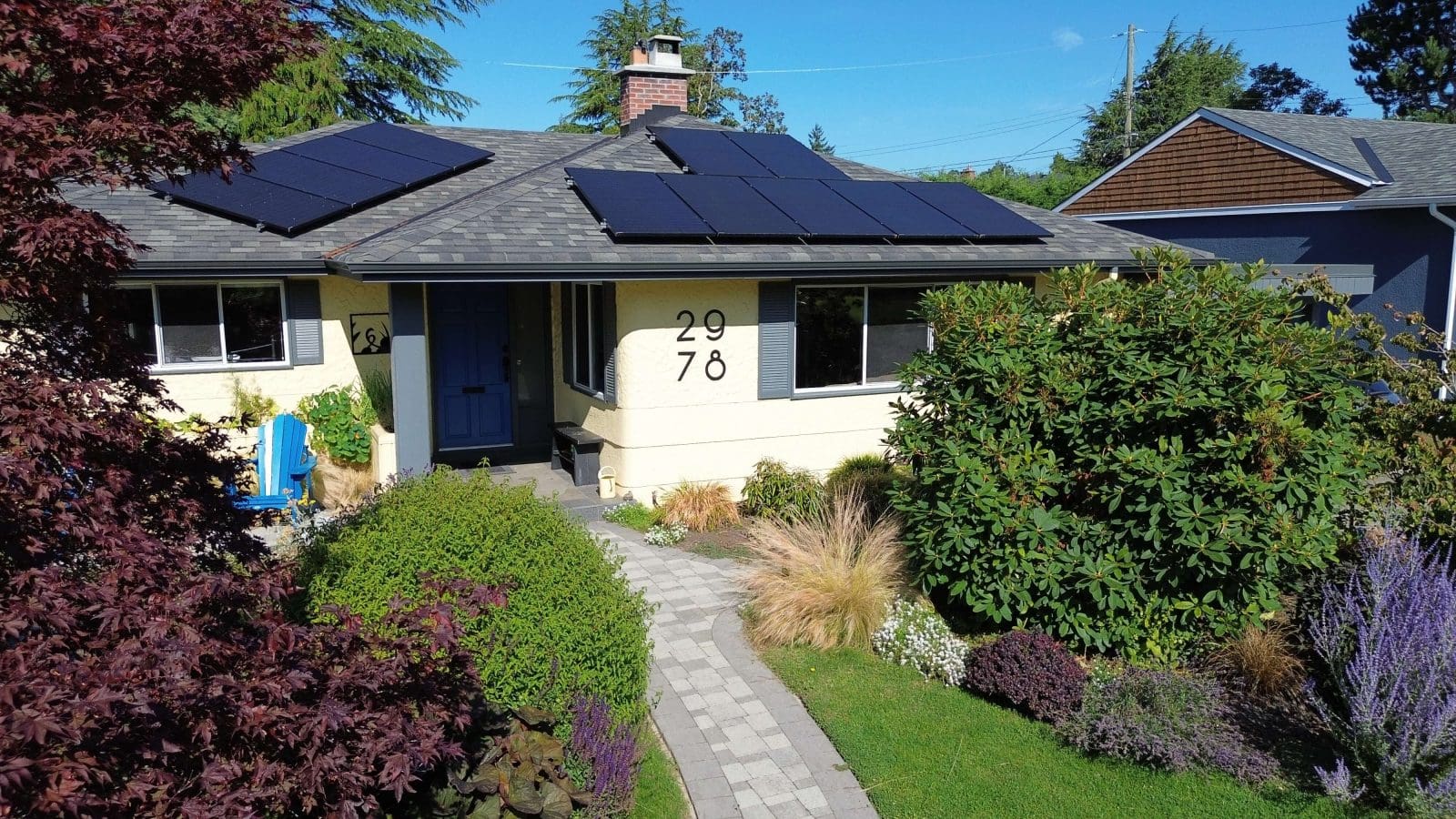 Front view of a home with solar panels installed on the roof