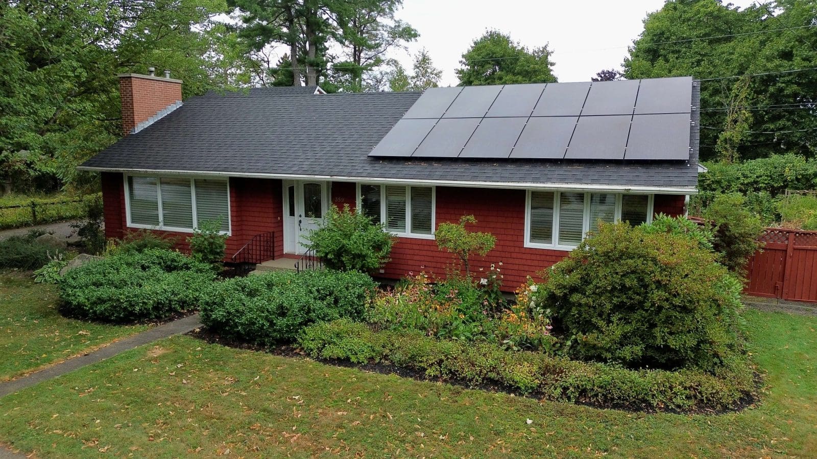 Home in New Brunswick with solar panels on the roof.
